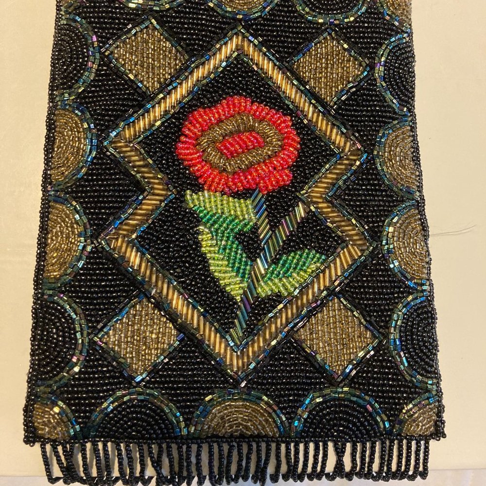 Lovely, beaded rose and diamond patterned fringed evening bag